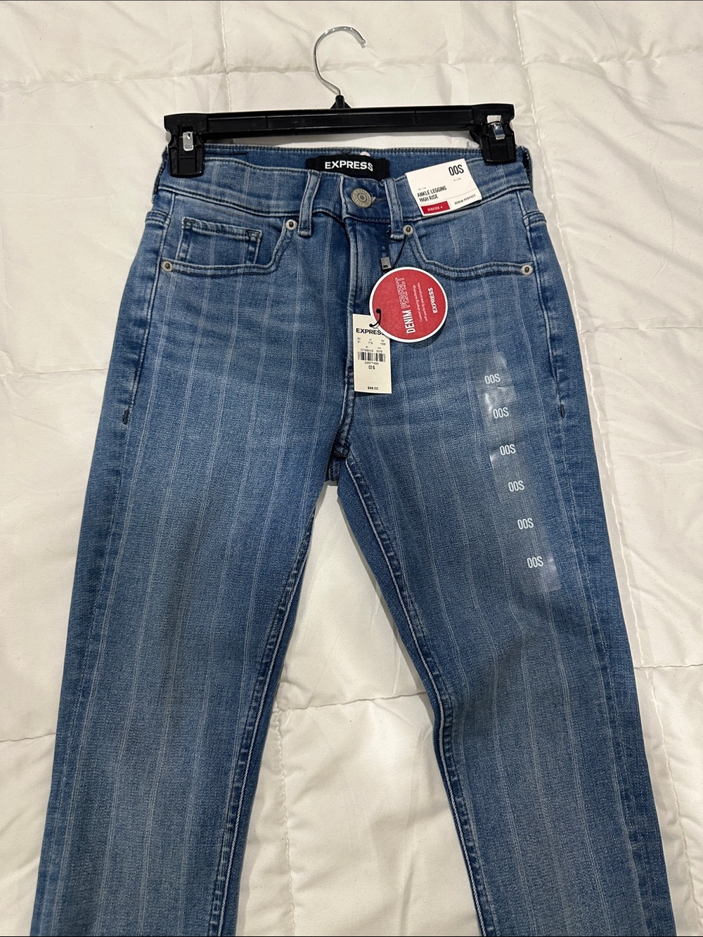 Express Women's Light Blue Skinny Jeans with Subtle Stripe Fade